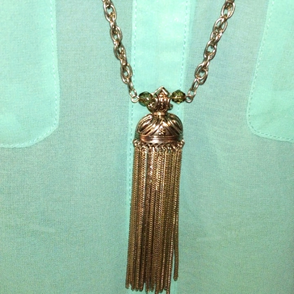 3-8-16Marylan Schiff Tassel and interesting silvertone beads and cap smoky beads